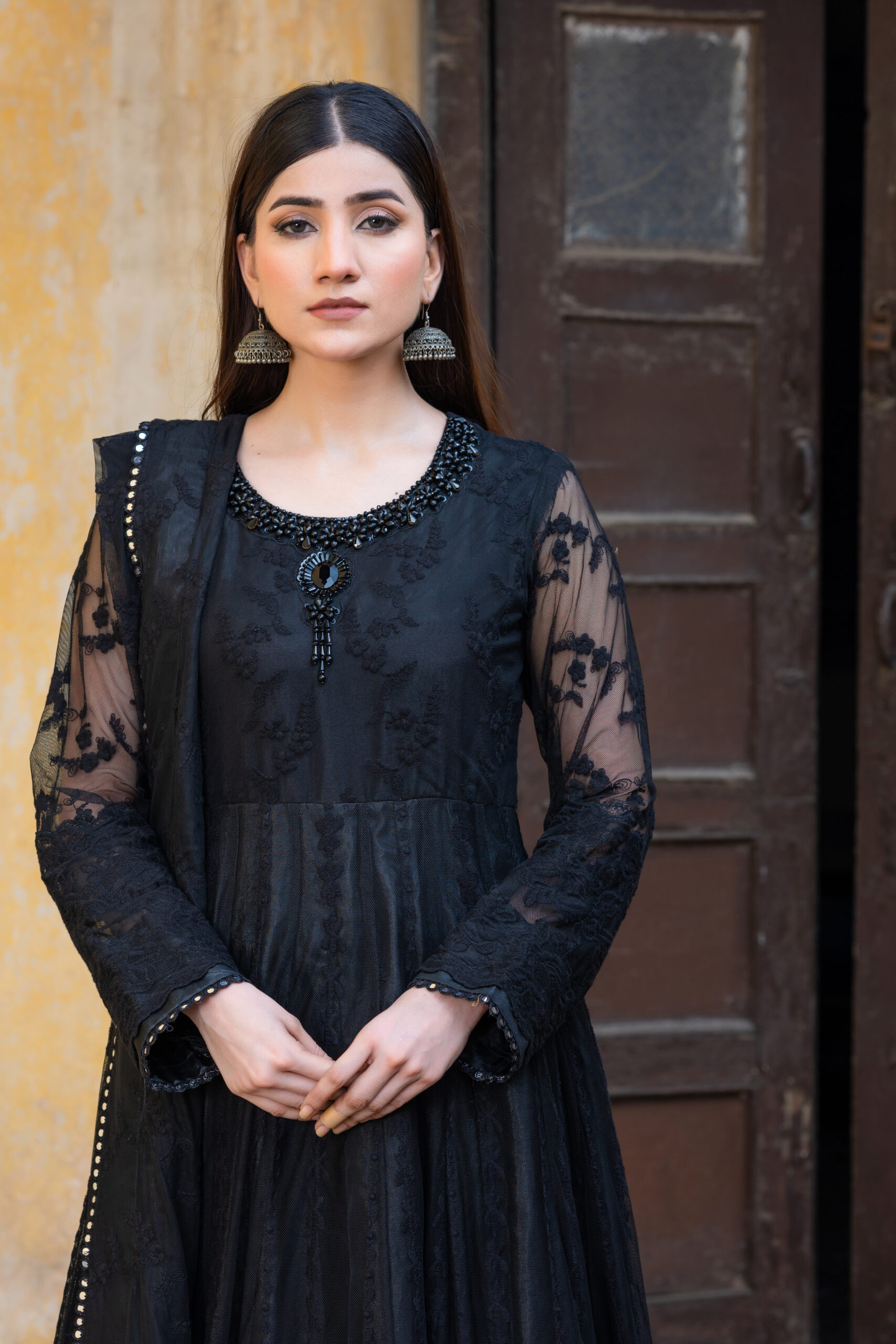 Black embroidered maxi with handwork on neckline and full sleeves adorned with fine thread embroidery and sequence lace.